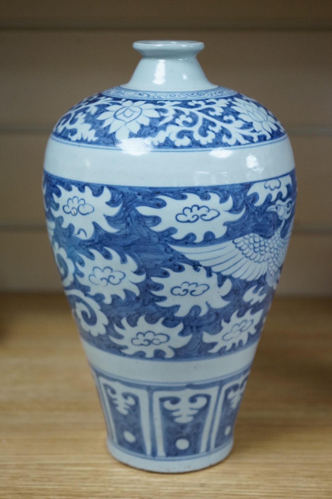 A Chinese blue and white phoenix vase, 27cm high